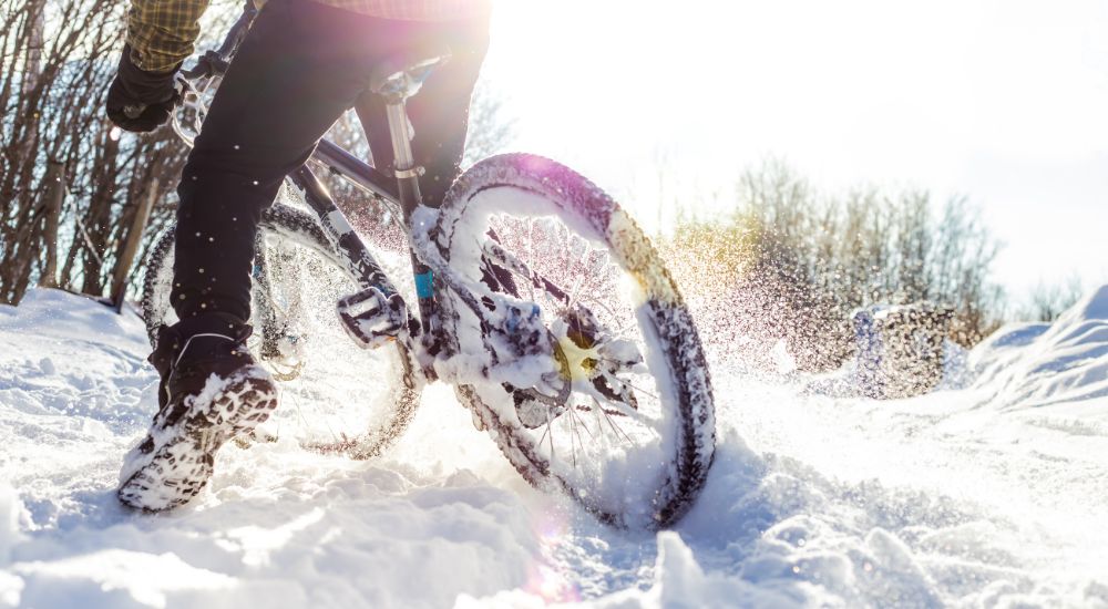 Winter bicycle sliding in the snow